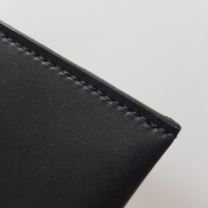 Détail de la couture au point sellier