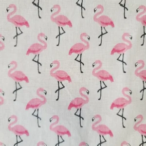 Vue de détail du motif de dessin des flamants roses imprimés sur coton